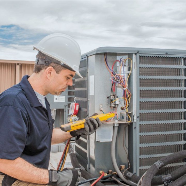 Blyth Heating & Cooling HVAC technician on a service call in Blyth, Ontario